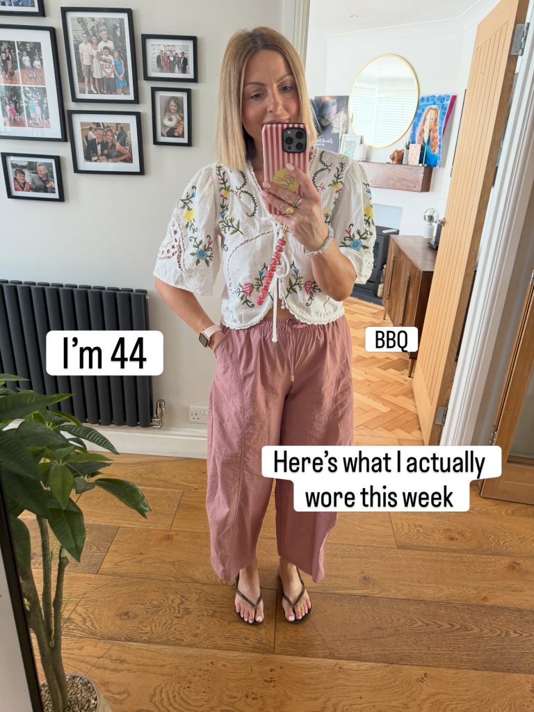 An Embroidered Cardigan with Pink Pants for a Casual Gathering
